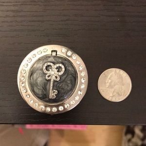 Purse hanger. Take it with you anywhere with you.